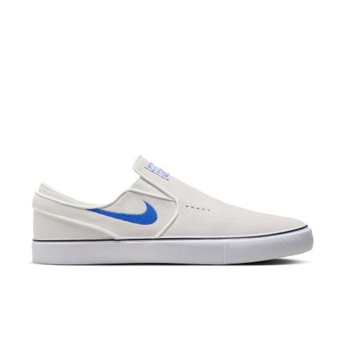 Nike SB Janoski+ Slip Shoes in Summit White and Hyper Royal, featuring suede upper and Zoom Air cushioning.