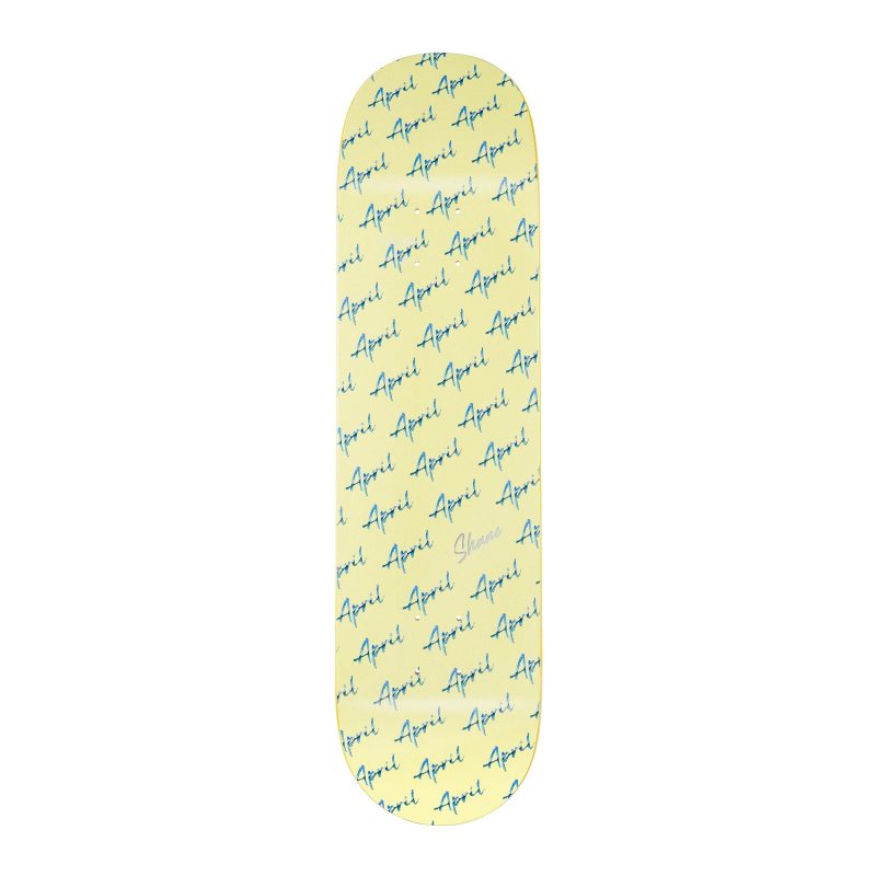 April Skateboards Shane Script Logo deck in yellow, all-over April script with reflective "Shane" hit, 32.2" x 8.5".